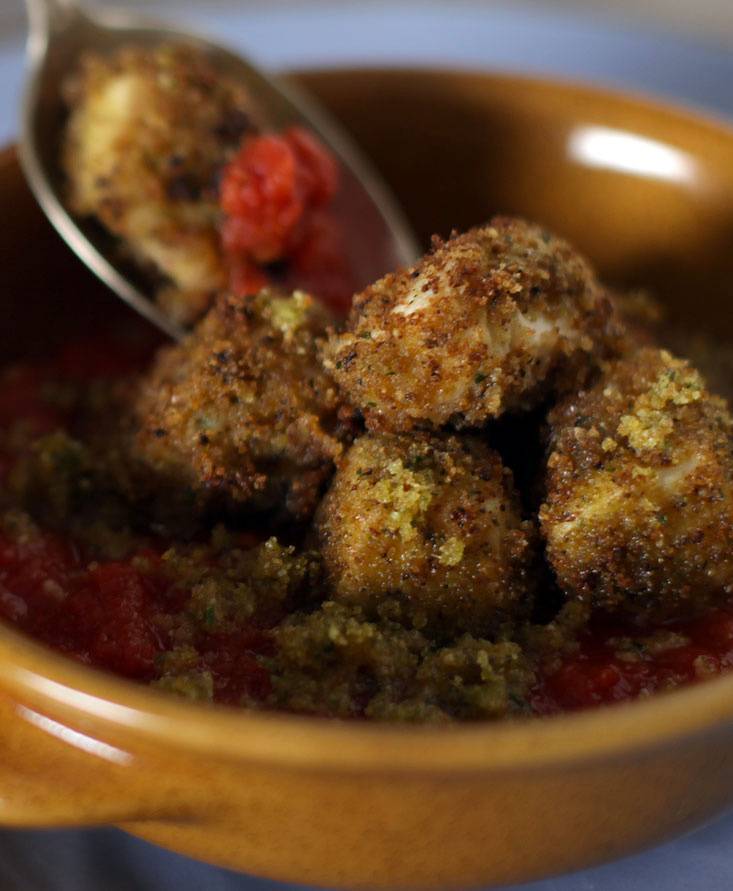 Chicken breast in Romagnola Crust and tomato sauce