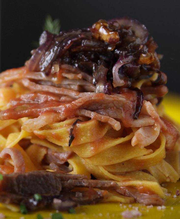 Fettuccine with Parma ham and caramelized onions