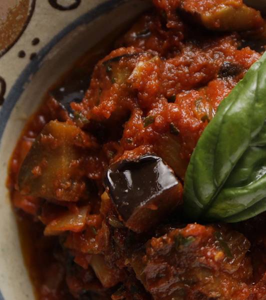 Taquitos de berenjena con tomate