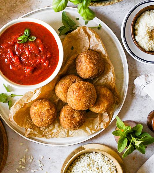 Albóndigas de arroz con prosciutto