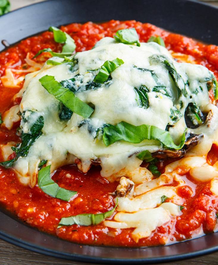 Spinach and Ricotta Stuffed Portobello Mushrooms in Tomato Sauce